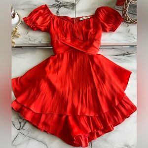 Woman’s orange playsuit- romper